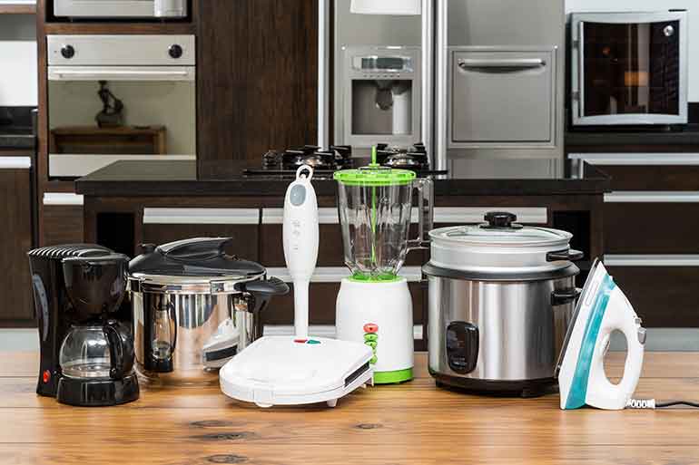 small household appliances on a kitchen counter.