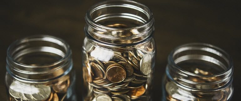 Jars full of coins.