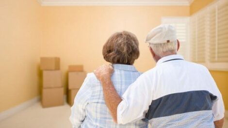 An older couple moves into a new home