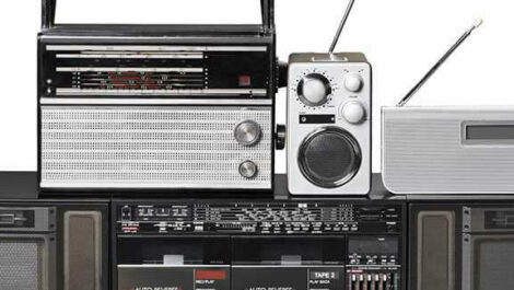 A series of electronics including a radio and sound system.