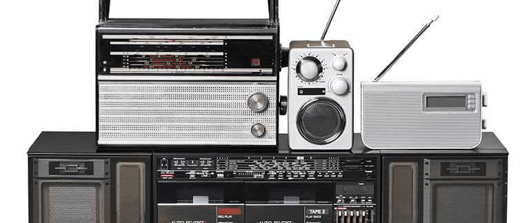 A series of electronics including a radio and sound system.