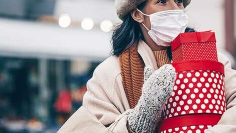 Woman Christmas shopping in Brooklyn during 2020 pandemic