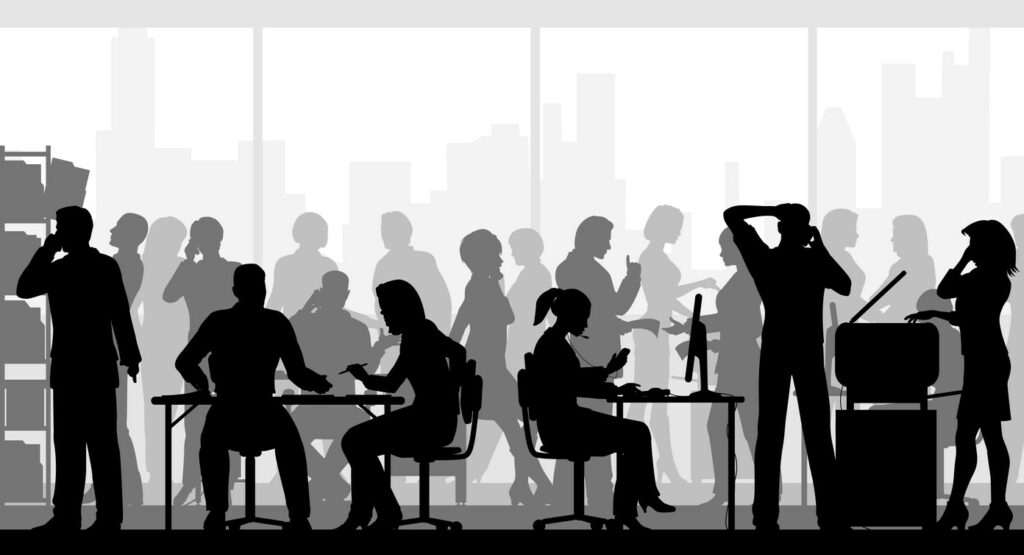 Bustling silhouettes of employees in an office. 