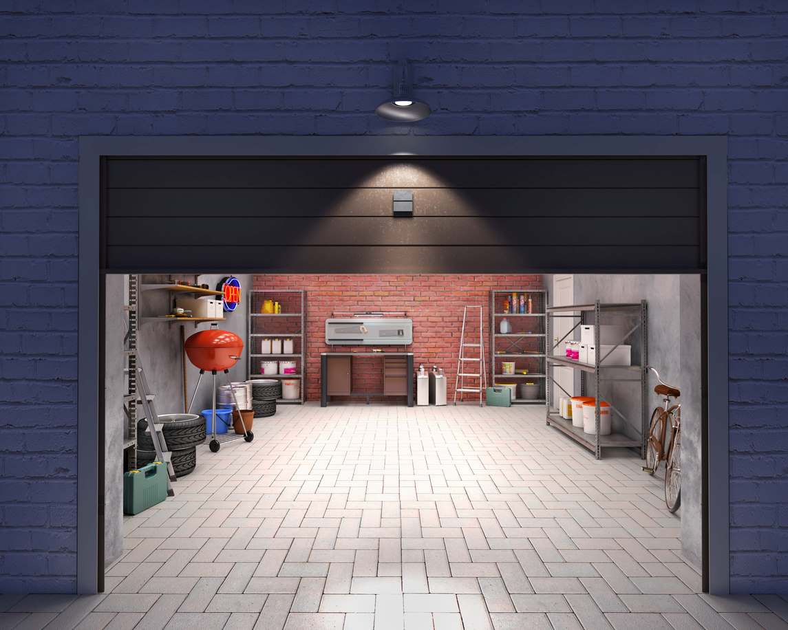 An organized home garage with the door open. The garage holds a bicycle, several grills, a ladder, and shelves of paint and supplies.