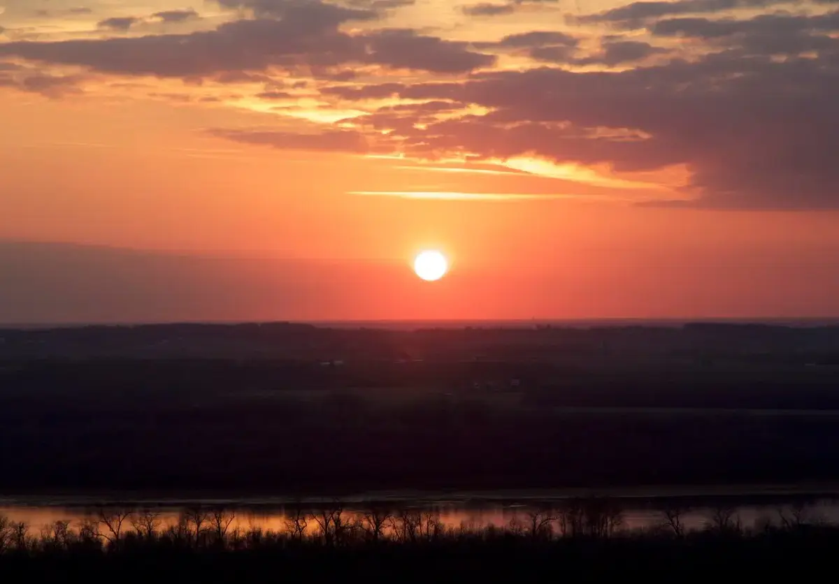 A deep orange sunset over a state park near Chicago