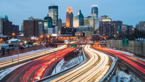Minneapolis skyline in the winter during rush hour.
