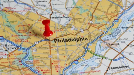 A map of the United States with a red pin marking the city of Philadelphia.