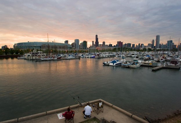 People fishing in a Chicago harbor.