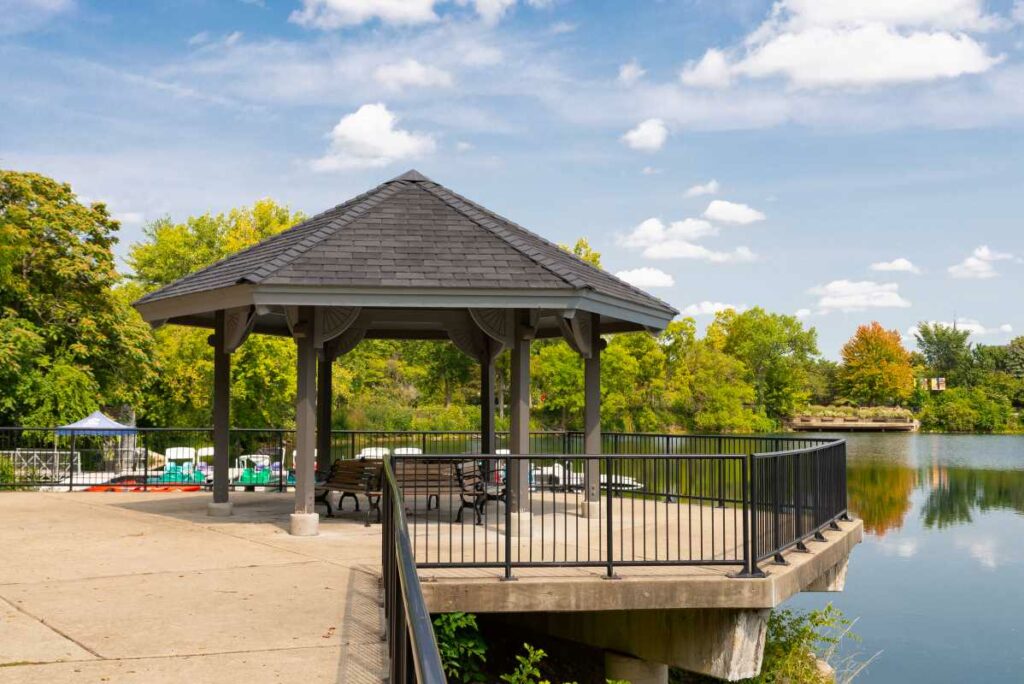 A gazebo on the Naperville Riverwalk on a sunny afternoon. 


