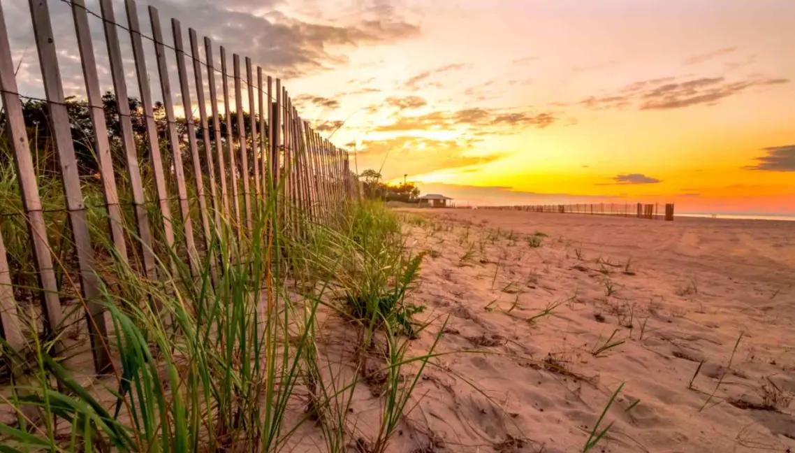 Sunset view from a sandy beach.