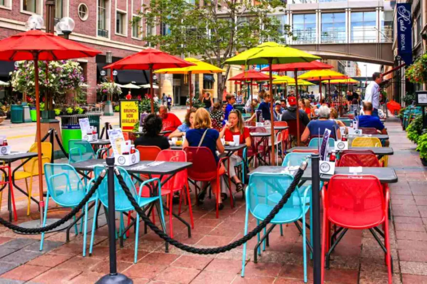 People dining outside a restaurant on Nicollet Mall Minneapolis MN