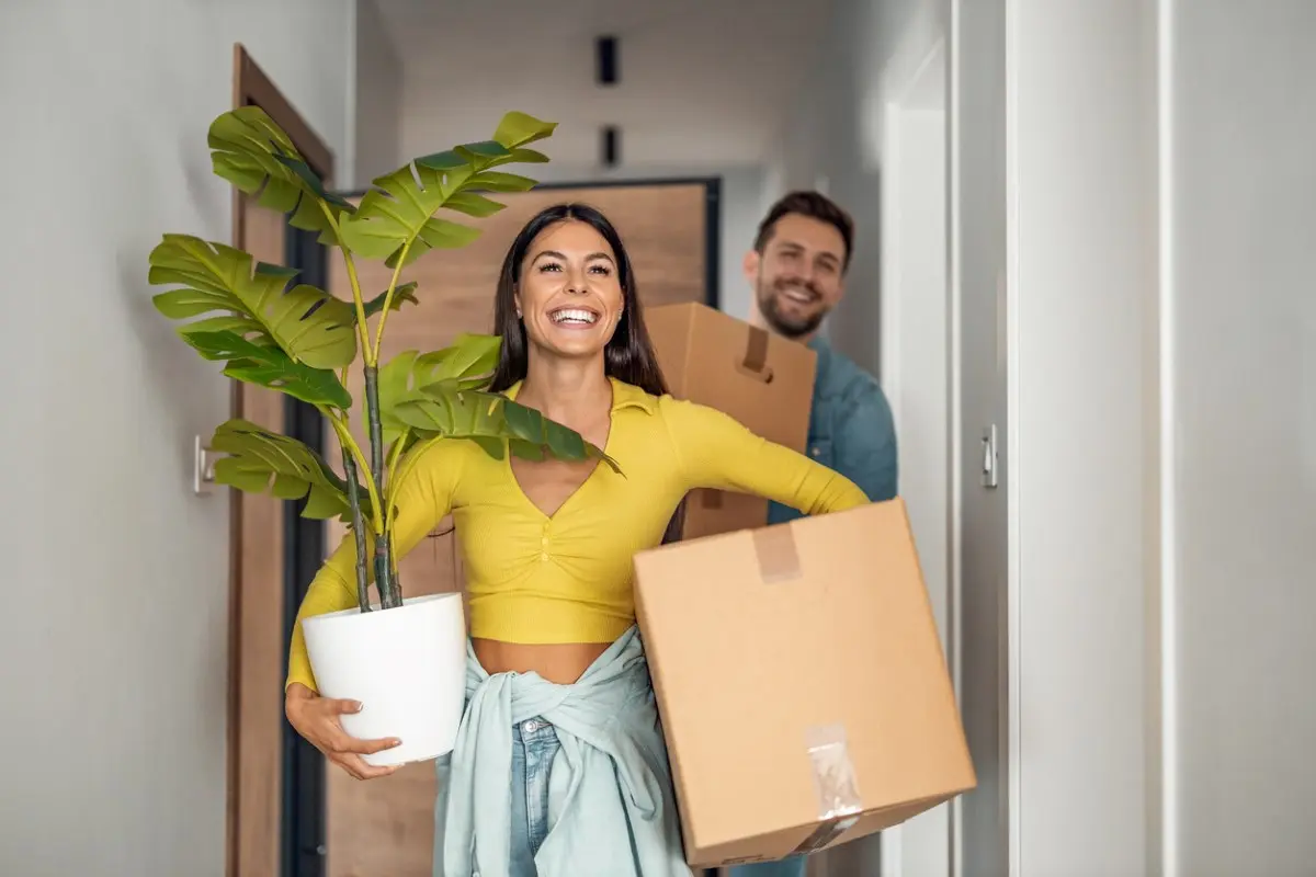 Young couple moving in new home